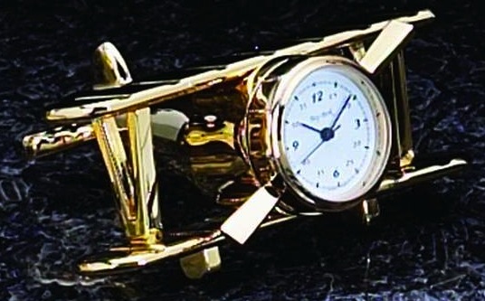 Airplane clock, brass.