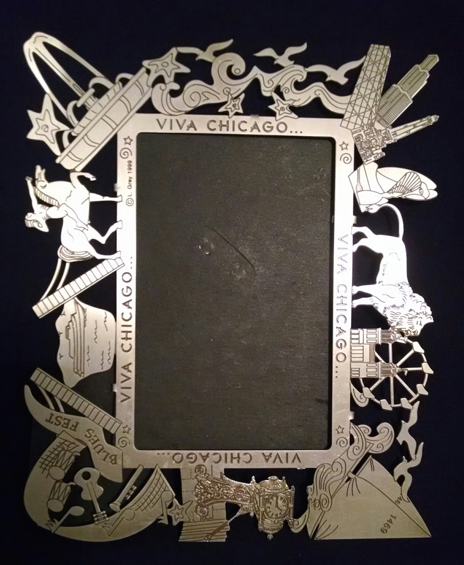 Nickel etched picture frame.
